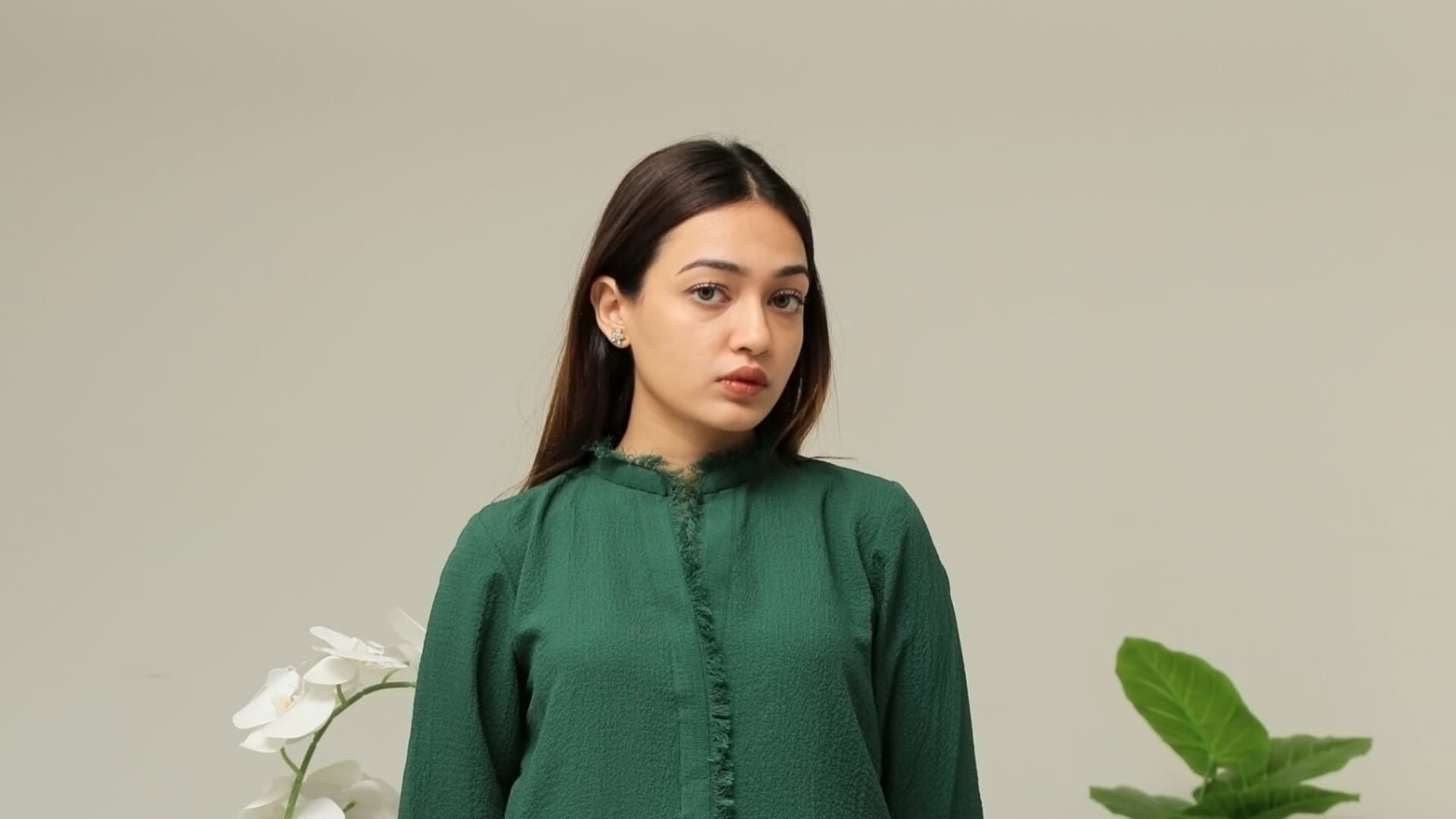 Model wearing Mintè — a soft green Layah co-ord set with effortless everyday elegance.